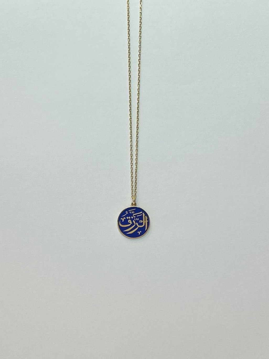 Er Rezzak Gümüş Üzerine Altın Kaplama Lacivert Mineli Kolye